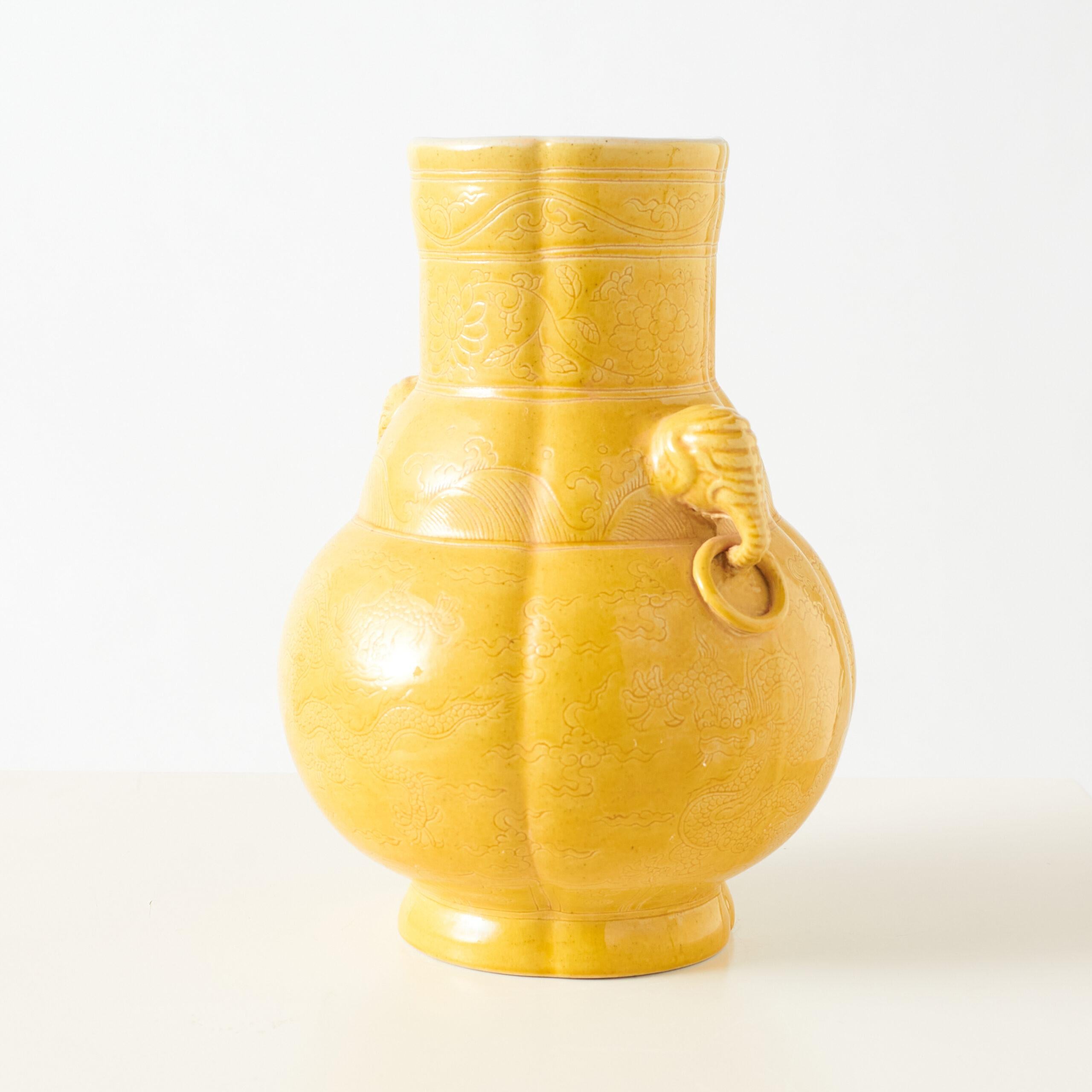 Yellow-Glazed Twin-Handled Vase

Porcelain vase in the style of the Ming Dynasty, featuring a yellow glaze and twin handles. The base bears a six-character mark—大明弘治年製—translating to “Made during the reign of Hongzhi of the Great Ming