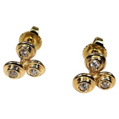 Boucles d'oreilles en forme de bulles en or jaune avec diamants de 0,25 carat