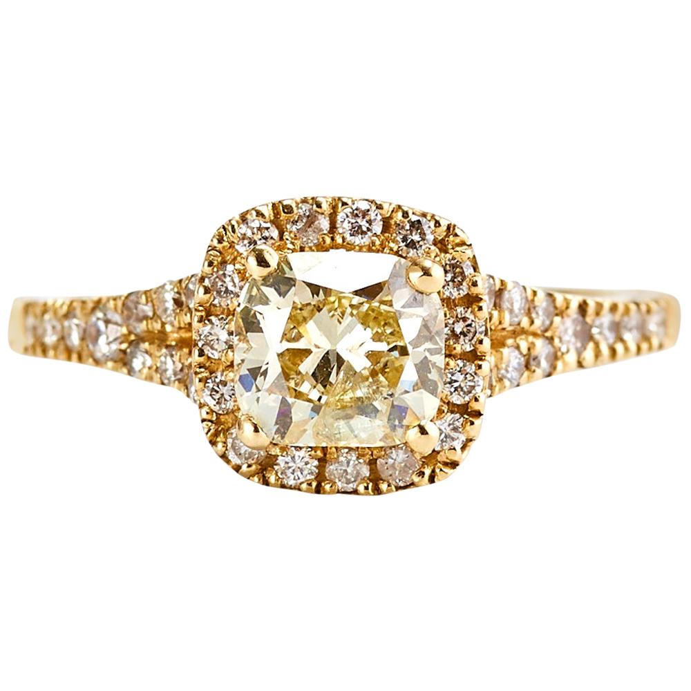 Yellow Gold 0.90 Carat Fancy Yellow Cushion Diamond Engagement Ring with a Halo  For Sale