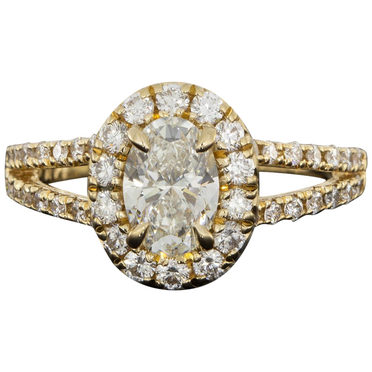 Yellow Gold 1.15 Carat Oval Diamond Halo Engagement Ring For Sale