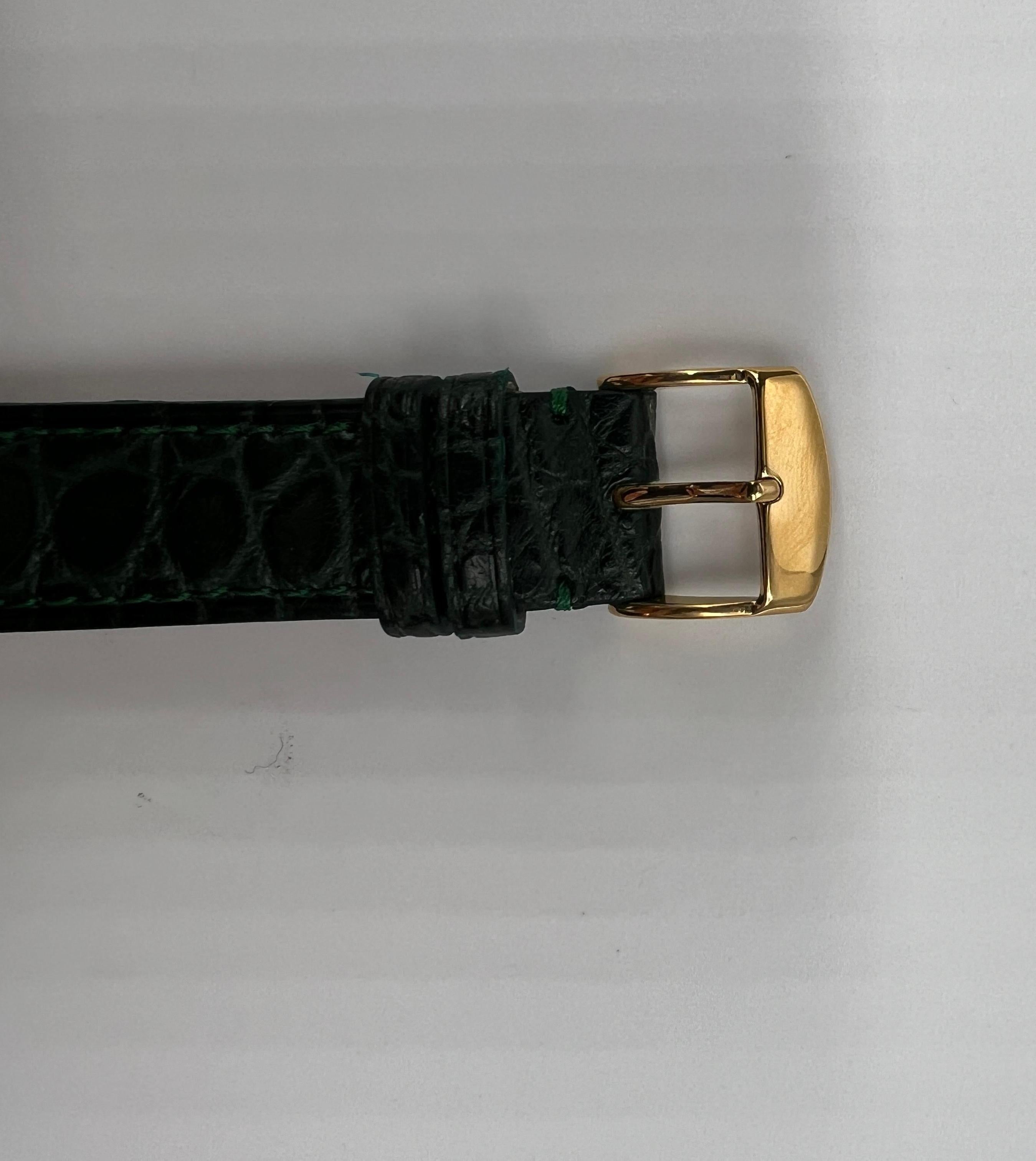 Women's or Men's Yellow Gold 18 Carats Green Leather Universal Geneve Watches For Sale