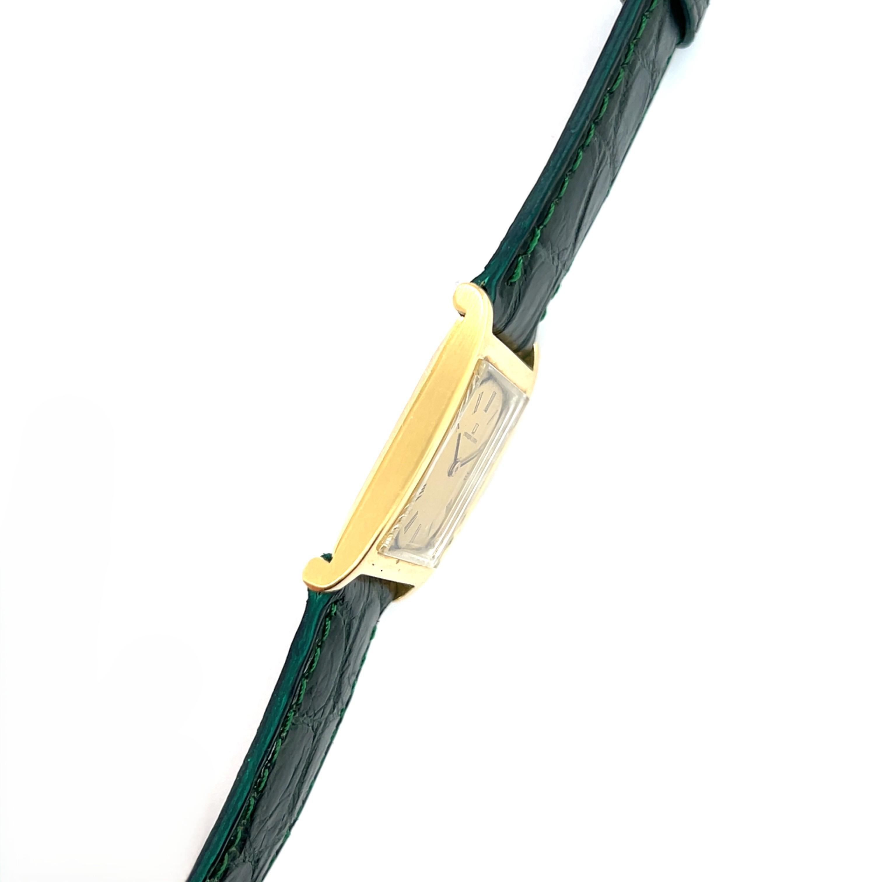 Montres Universal Geneve en or jaune 18 carats et cuir vert Unisexe en vente