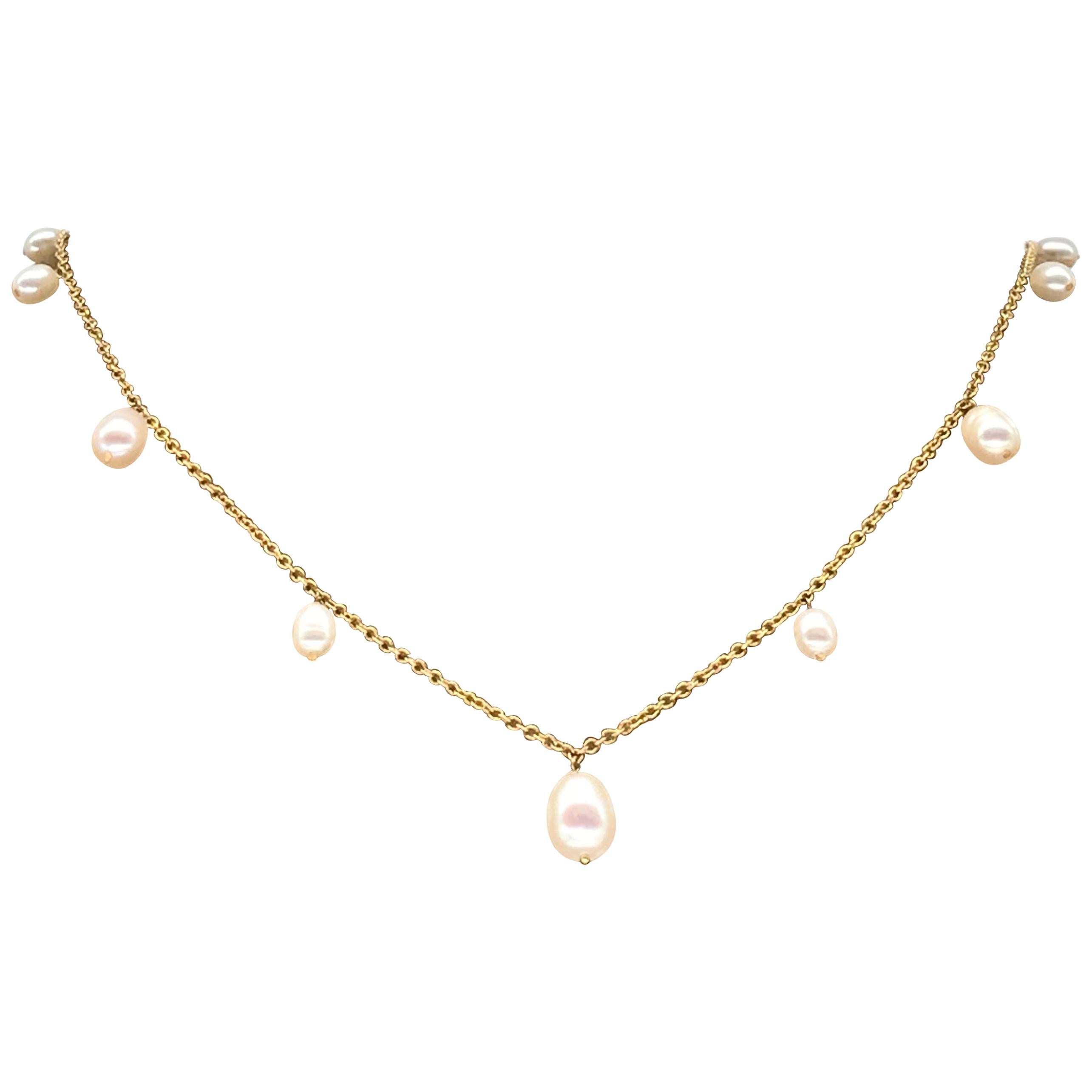 Yellow Gold 18k Jaserons Chain
Weight of Gold :  4 grams
11 Natural FreshWater Pearls 
Length 52.5 cm / 20,47 inch