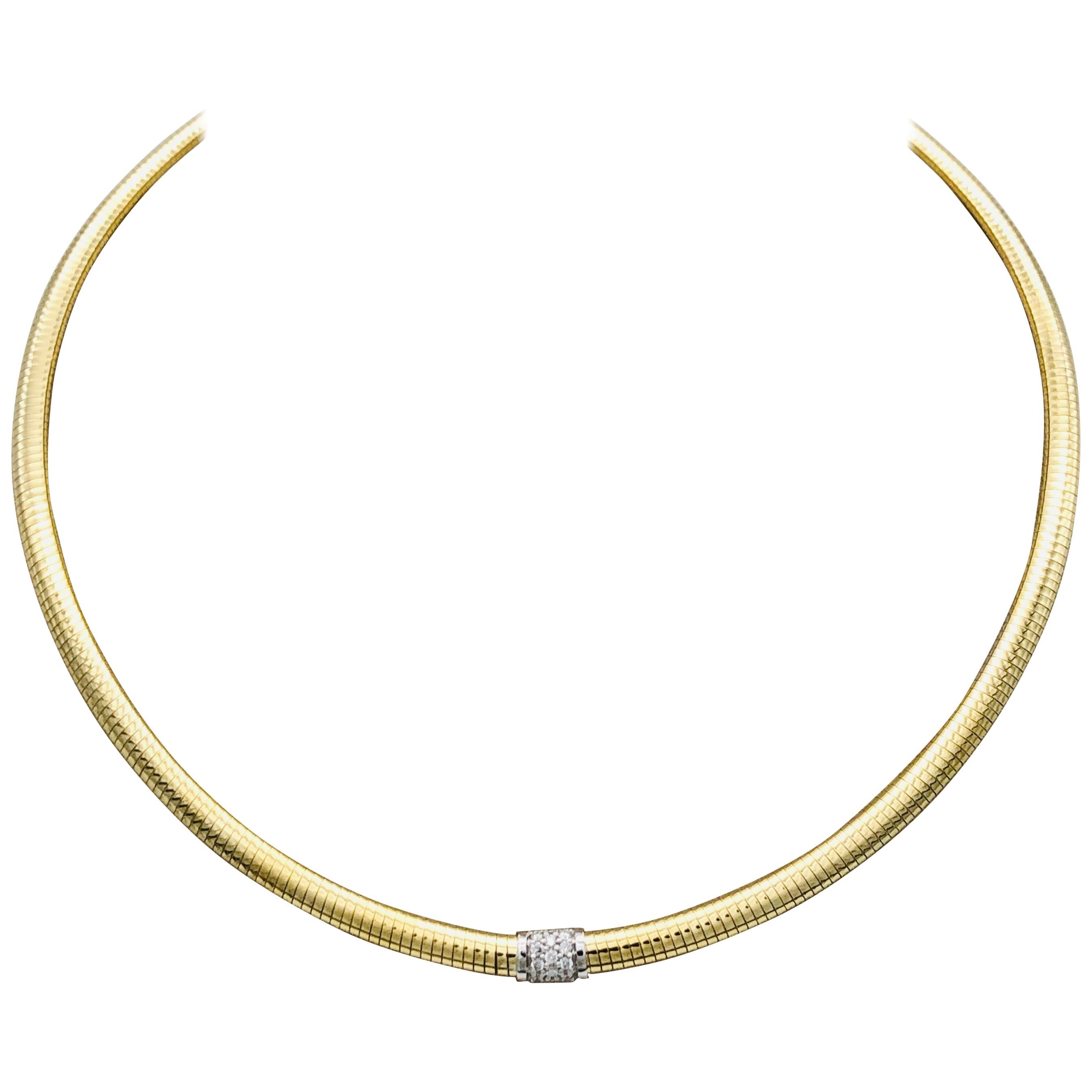 Yellow Gold 18 k Choker Neacklace and Diamonds Brillant Cut 
White Diamonds Brillant Cut : 0.15
Weigth Of Gold  18 kt gold,25,40 Grams 
Security Claps 
Tubogas processing and natural diamond pavé for jewels with important volumes and contemporary