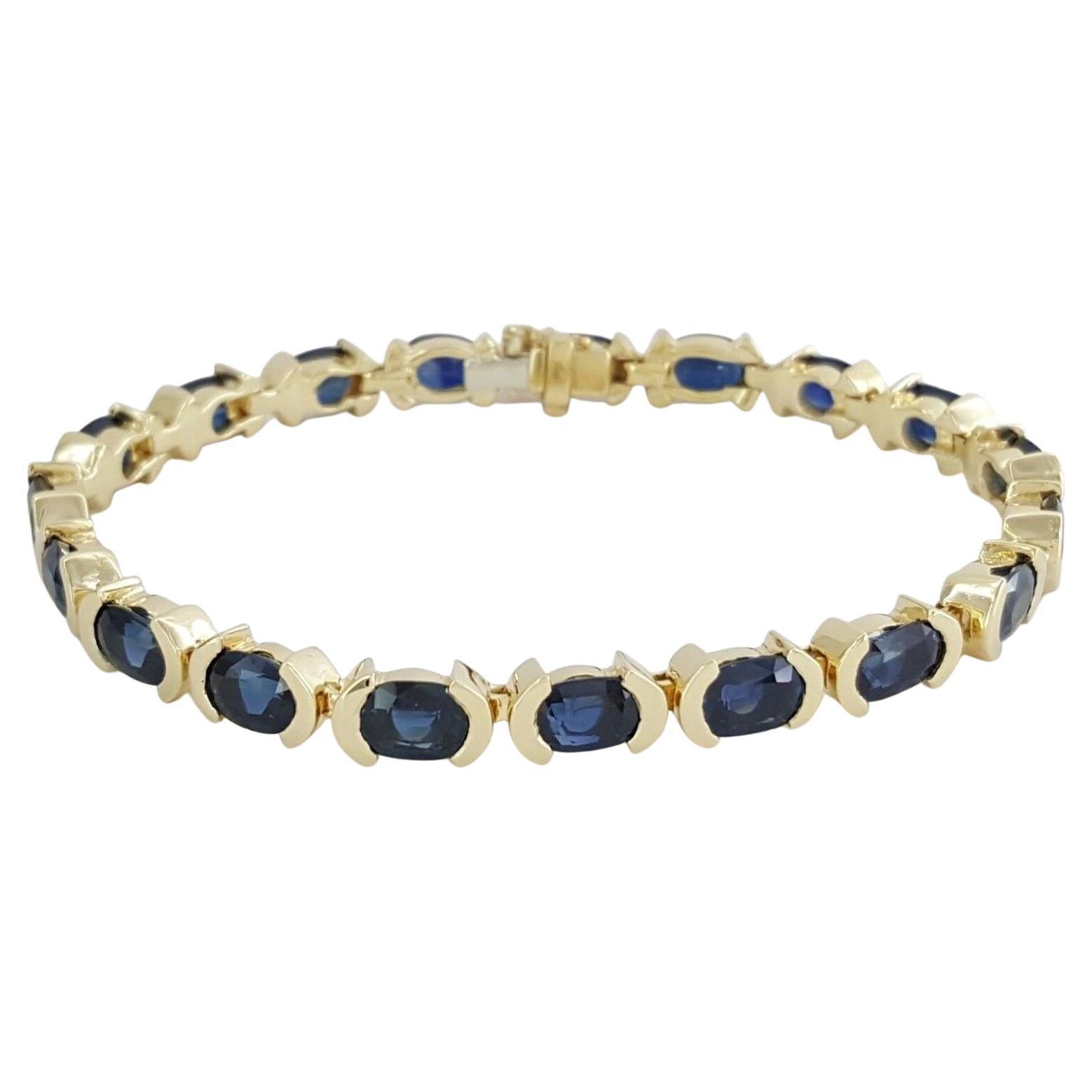 Yellow Gold 19ct Total Weight Oval Cut Blue Sapphire Tennis Bracelet For Sale