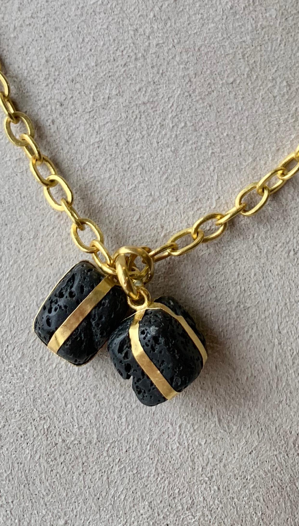 Lava packages in 22 Karat gold. Sold singlely or as a pair. Here price is quoted for the pair.
Hip & hot + fun to wear. 
Dislayed on a mini Sailor's knot chain with toggle clasp, here for display purposes only but can be purchased separately, also