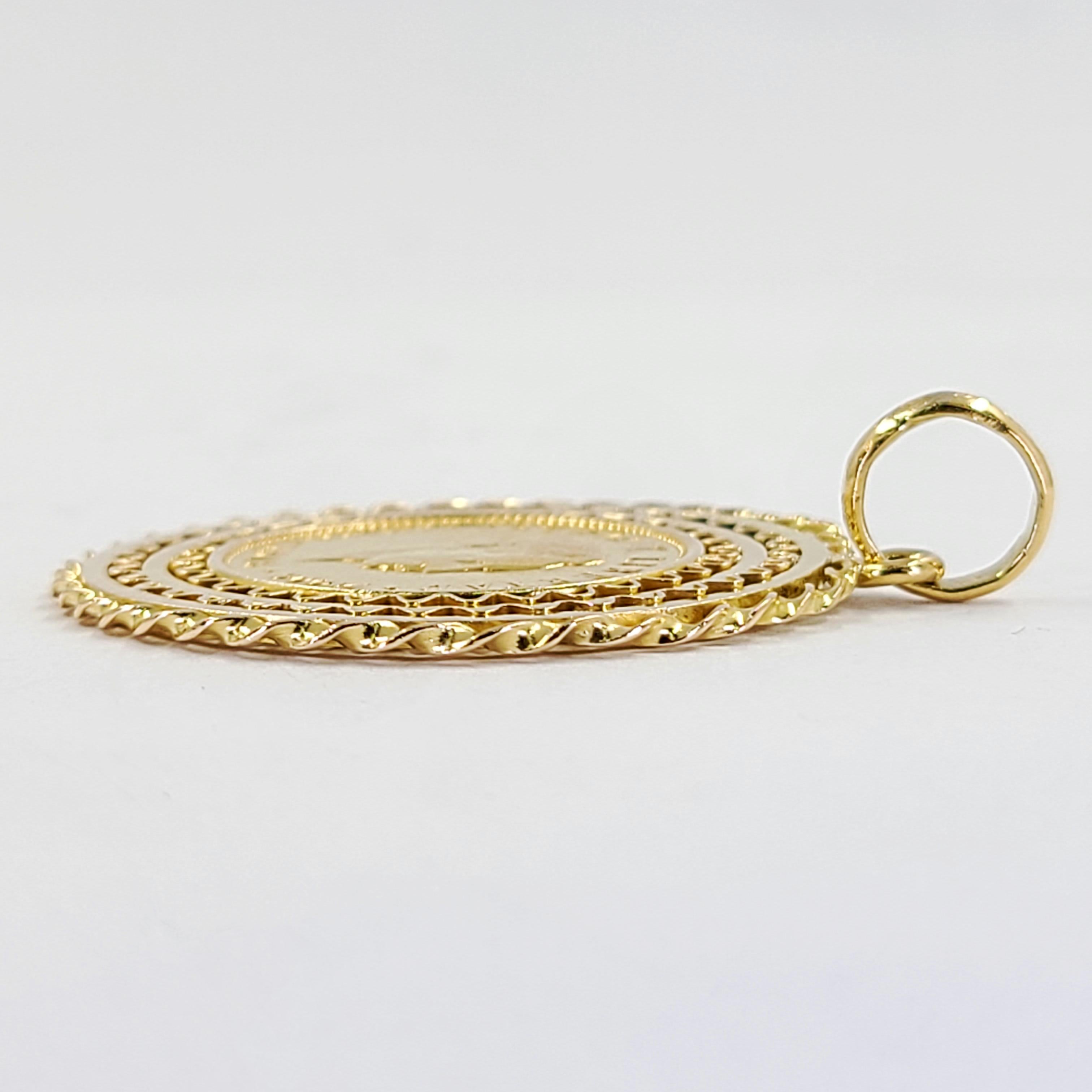 gold coin pendant with diamond bezel