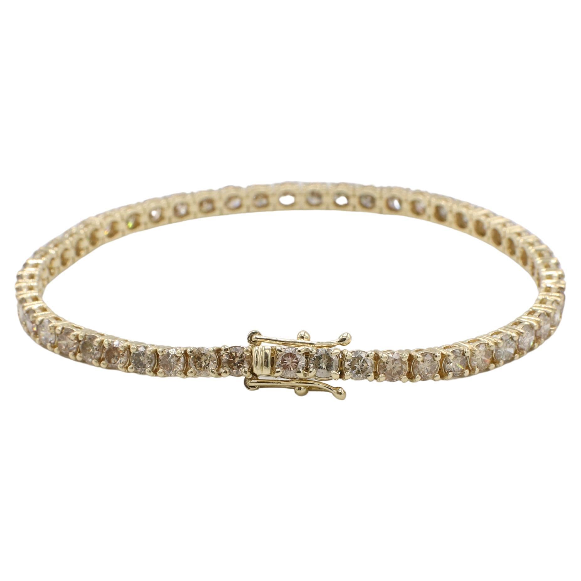 Gelbgold 6,64 Karat natürliche Champagner farbigen Diamanten Tennis Line-Armband
Metall: 14k Gelbgold
Gewicht: 9.84 Gramm
Diamanten: 6,64 CTW runde hellbraune VS-SI Naturdiamanten
Länge: 7 Zoll
Breite: 3 mm