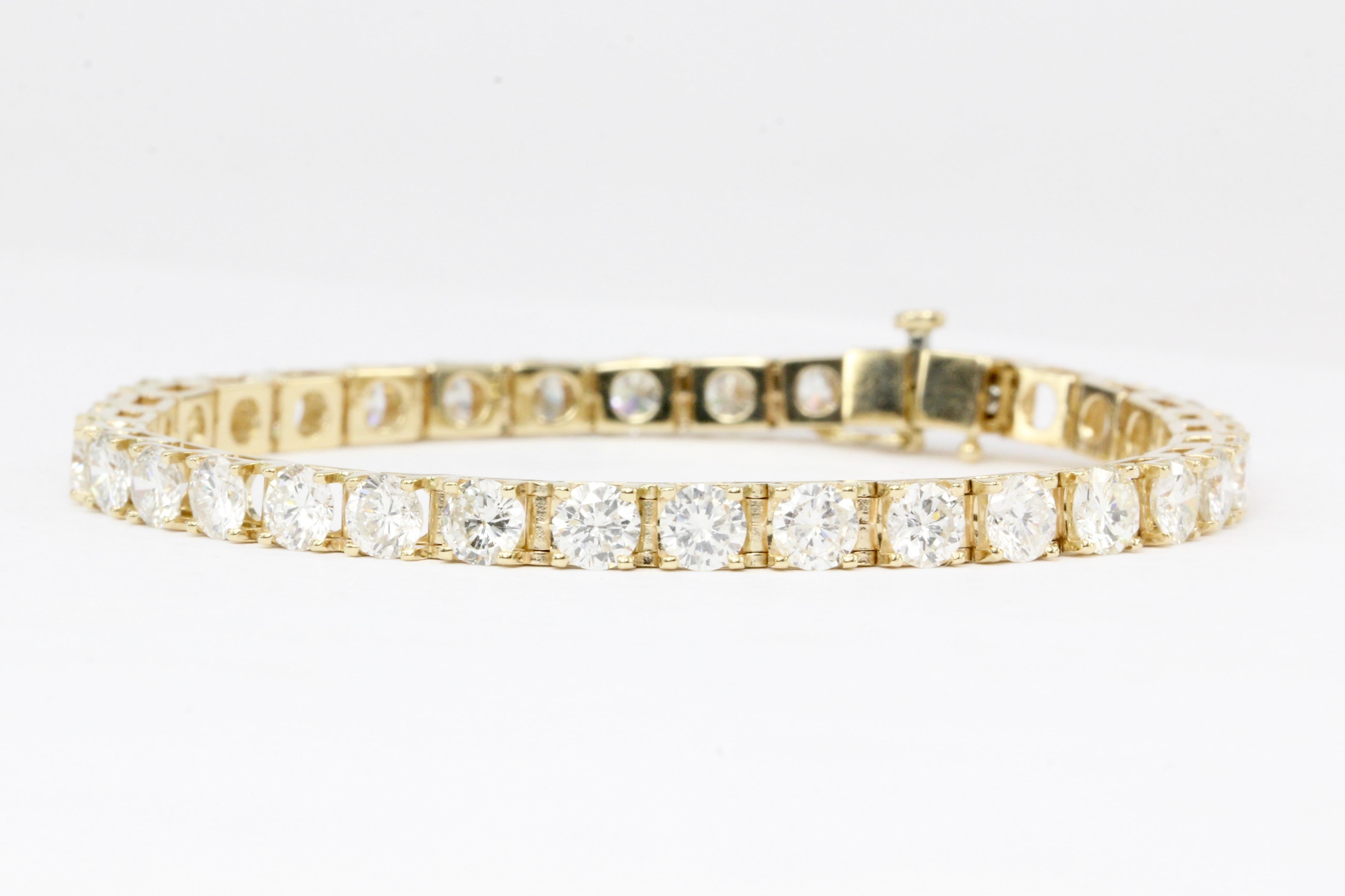 Hallmarks: 14K

Composition: 14K Yellow Gold

Primary Stone: Diamond 

Shape: Rounds 

Color/Clarity: G/H - I1

Total Diamond Weight: Approximately 7 carats

Bracelet length: 6.25 inches

Bracelet width: 3.95mm

Bracelet Weight: 11.4 grams