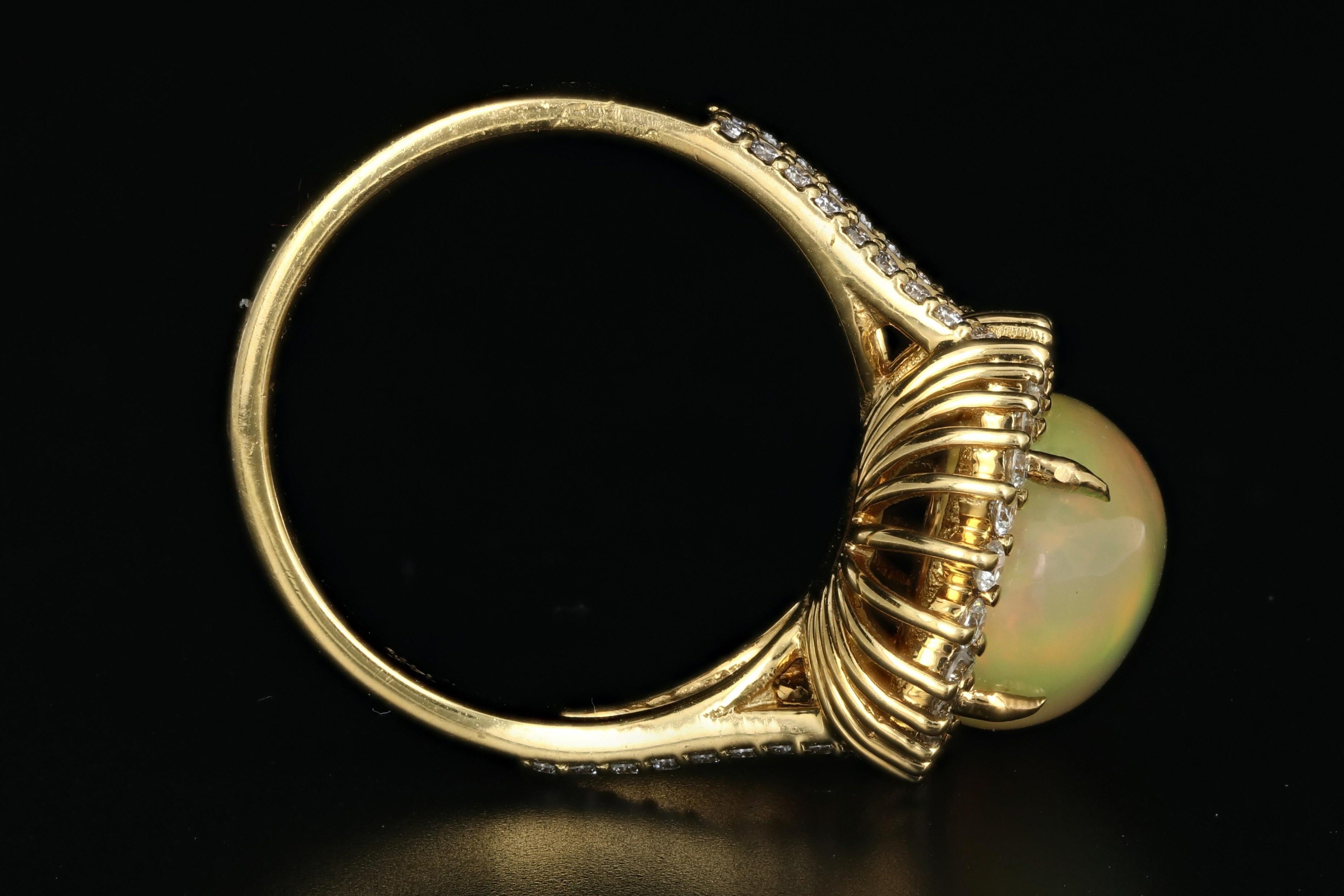 Women's Yellow Gold 8.5 Carat Ethiopian Opal with Diamond Halo Ring