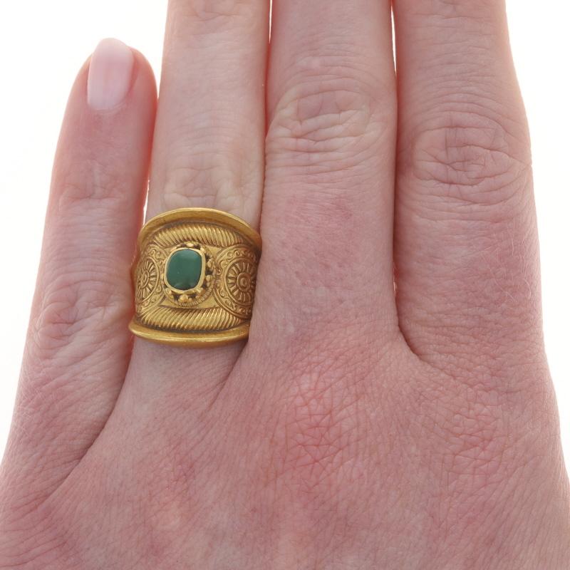 Size: Adjustable

Design:  Chinese
Era: Antique

Metal Content: 24k Yellow Gold

Stone Information

Natural 