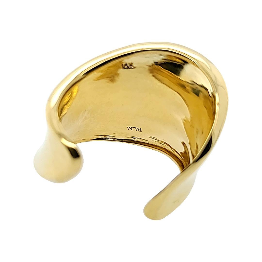 Channel the Look of Tiffany's Bone Cuff Collection with this 18 Karat Yellow Gold Wide Open Wave Ring Featuring Adjustable Sizing 8 - 11. Plain High Polish Design Weighing 21.4 Grams.