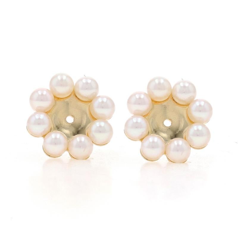 Metal Content: 14k Yellow Gold

Stone Information
Akoya Pearls
Color: Cream
Size: 3.3mm

Style: Halo Earring Enhancer Stud Jackets

Measurements
Tall: 15/32
