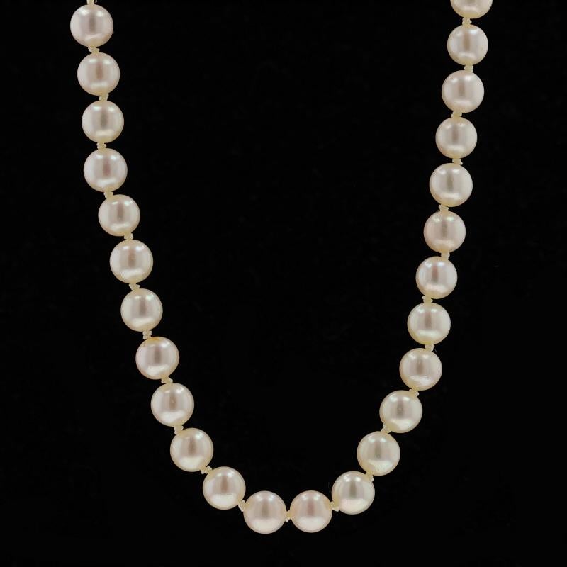 Metal Content: 18k Yellow Gold

Stone Information
Akoya Pearls
Color: Cream
Size: 6.6mm - 6.8mm (7.9mm clasp)

Style: Knotted Strand
Fastening Type: Fishhook Clasp with Safety Bar

Measurements
Length: 37