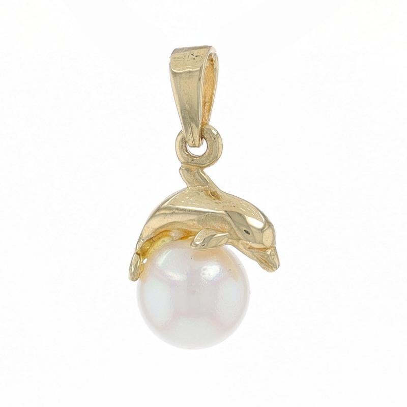Metal Content: 14k Yellow Gold

Stone Information

Akoya Pearl
Diameter: 6.8mm

Style: Solitaire
Theme: Playful Dolphin, Ocean Life

Measurements

Tall (from stationary bail): 9/16
