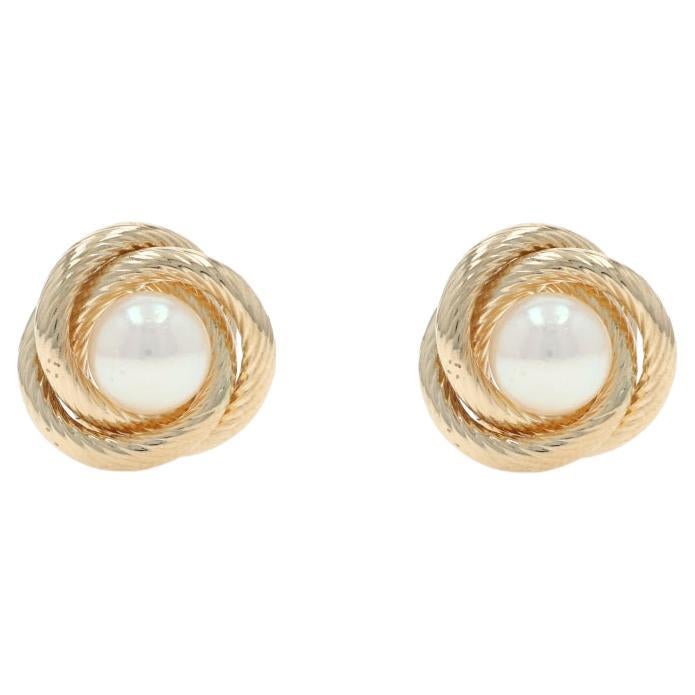 Boucles d
oreilles or jaune perle Akoya triple cercle - 14k percées
