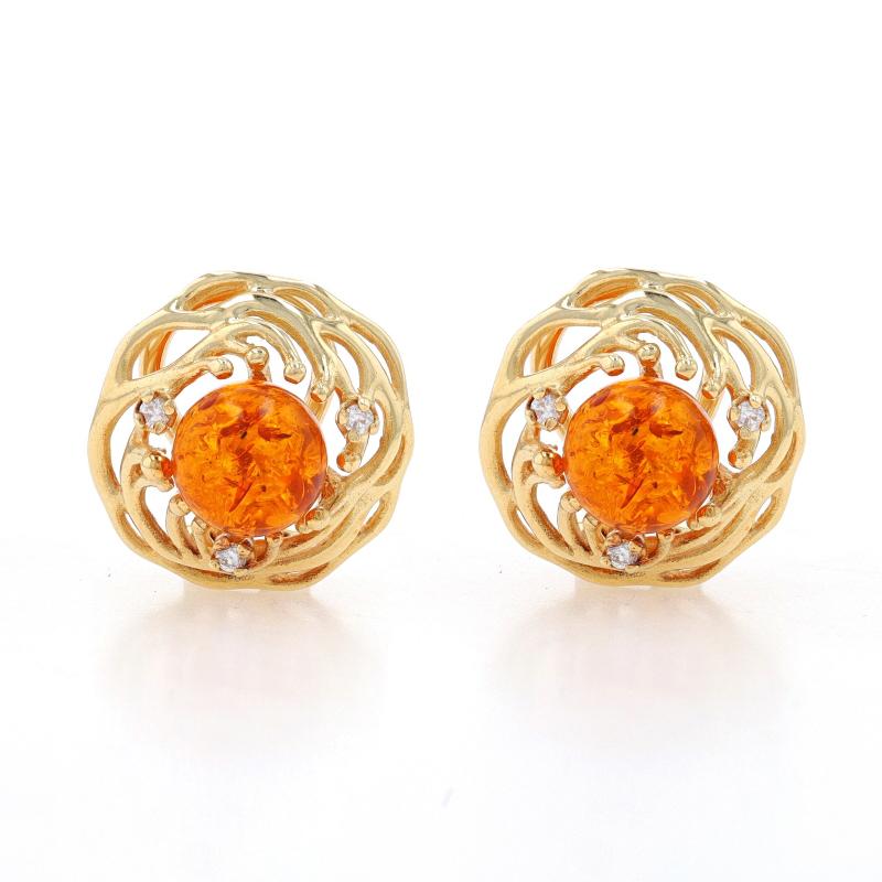 Metal Content: 14k Yellow Gold

Stone Information
Natural Amber
Cut: Round Cabochon
Color: Orange

Natural Diamonds
Carat(s): .10ctw
Cut: Round Brilliant
Color: F - G
Clarity: VS1 - VS2

Total Carats: .10ctw

Style: Large Stud
Fastening Type: Omega