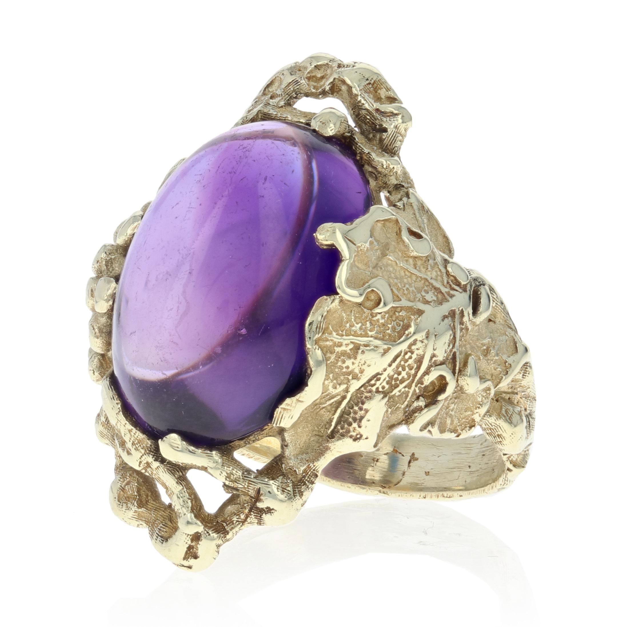 Size: 4
Sizing Fee: Up 2 sizes for a $30 fee

Brand: Walton & Co.
Era: Arts & Crafts 1930s - 1940s

Metal Content: Guaranteed 14k Gold as stamped

Stone Information: 
Genuine Amethyst
Color: Purple  
Cut: Cabochon
Carat: 6.30ct

Style: Cocktail