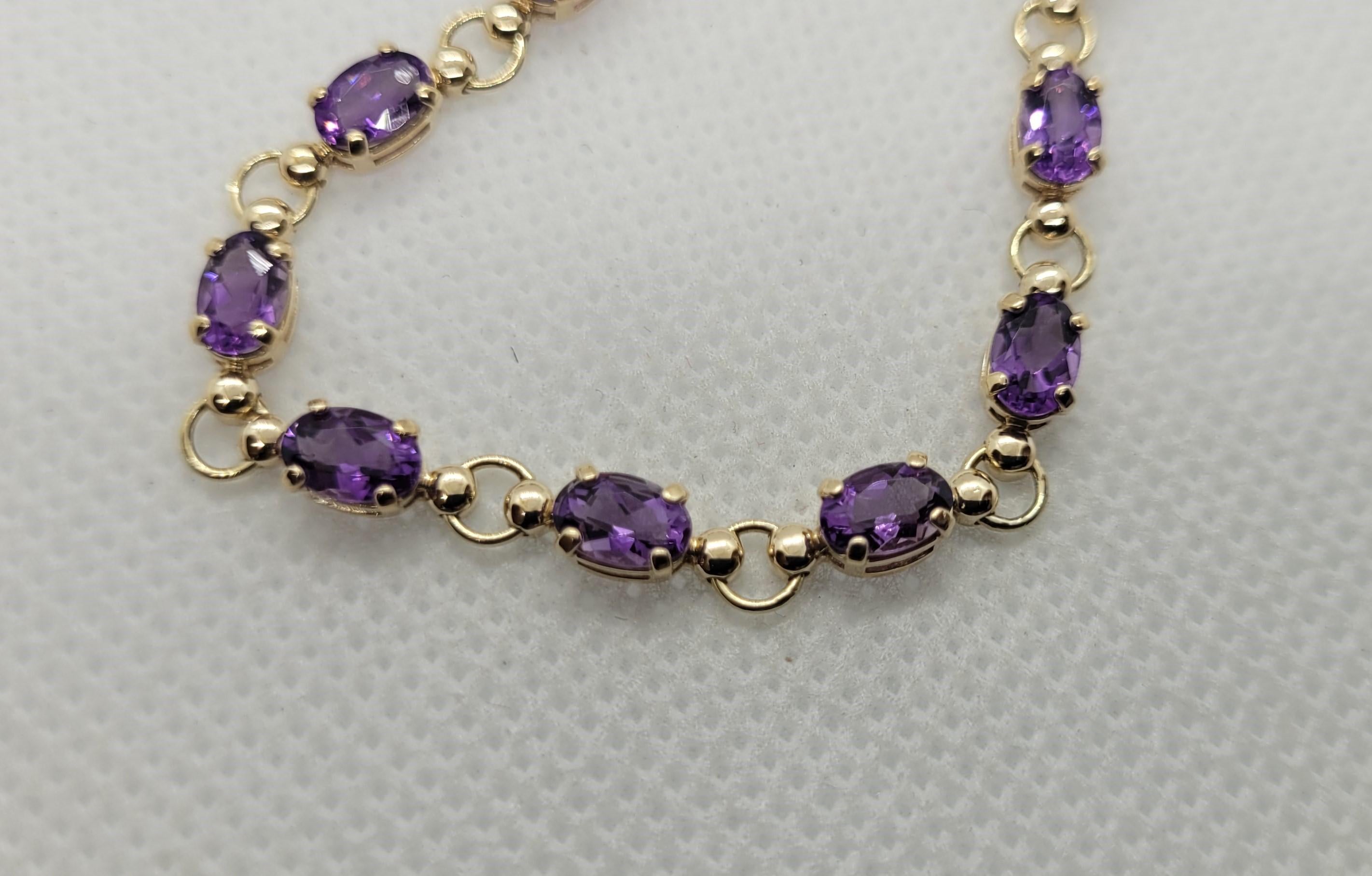 Modern Yellow Gold Amethyst Bracelet, 6 x 4 mm Oval Amethyst, 10kt Gold, 7.25 Inches For Sale