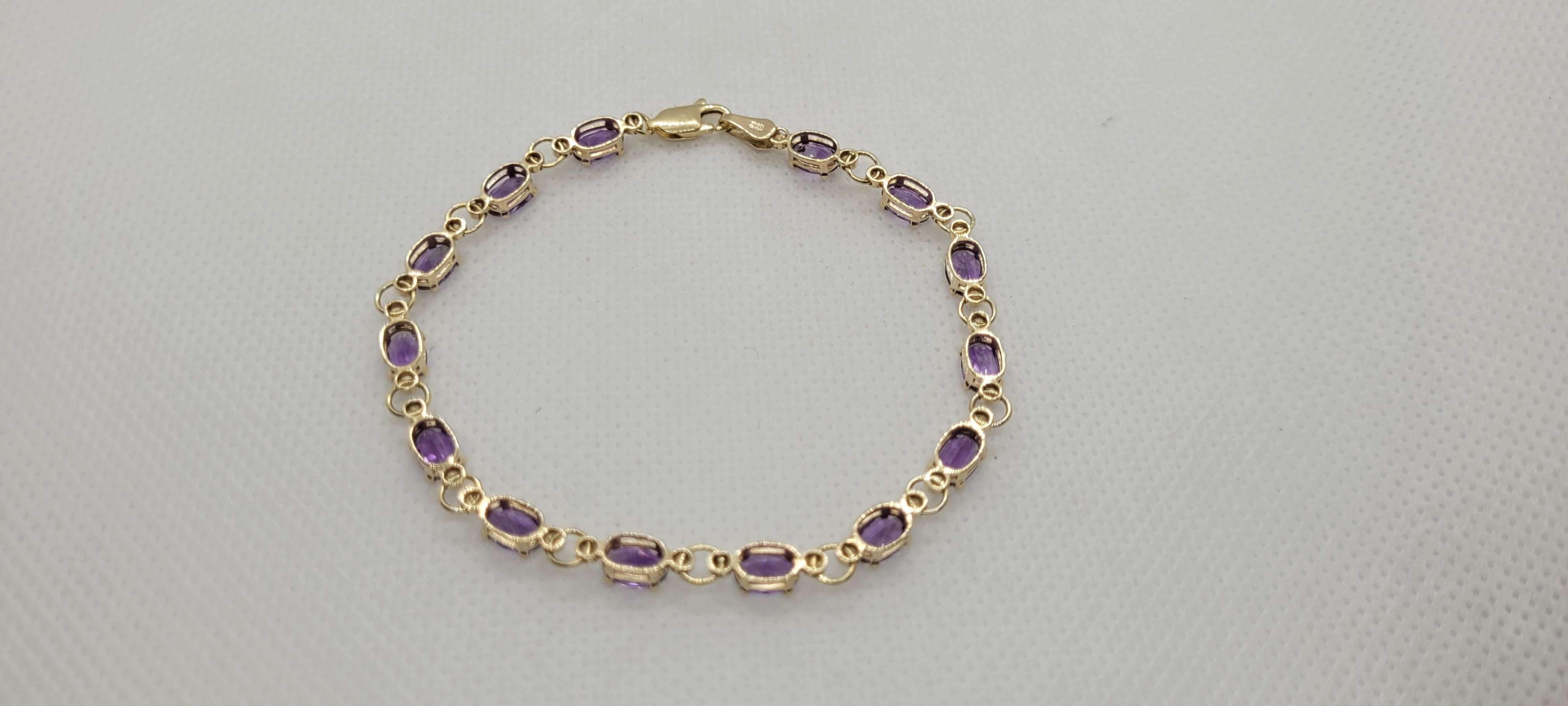 Oval Cut Yellow Gold Amethyst Bracelet, 6 x 4 mm Oval Amethyst, 10kt Gold, 7.25 Inches For Sale