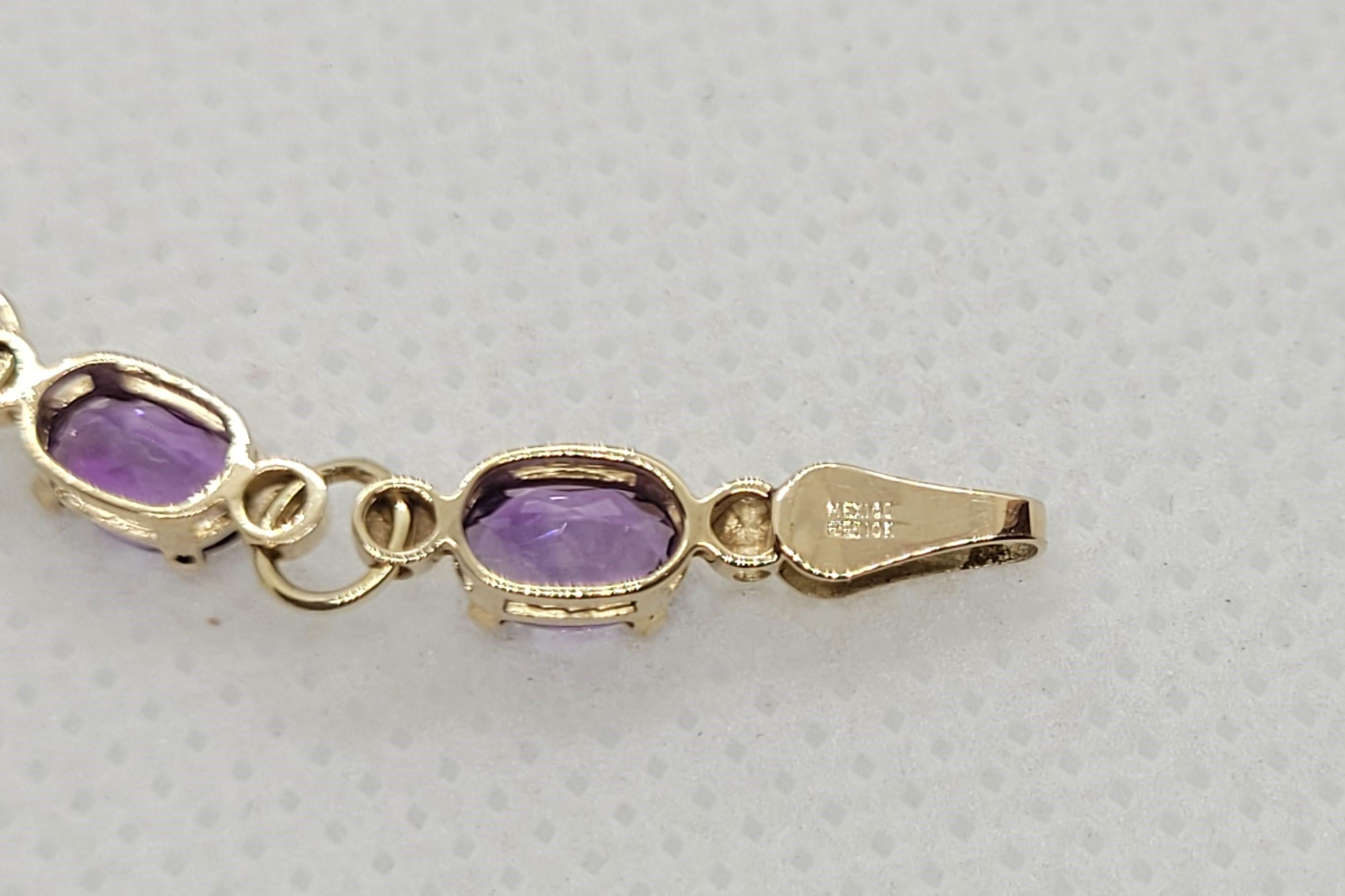 Women's Yellow Gold Amethyst Bracelet, 6 x 4 mm Oval Amethyst, 10kt Gold, 7.25 Inches For Sale