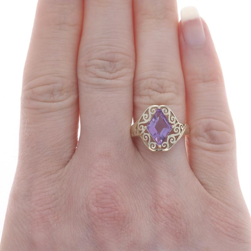 Size: 7
Sizing Fee: Up 2 sizes for $35 or Down 2 sizes for $30

Metal Content: 10k Yellow Gold

Stone Information

Natural Amethyst
Carat(s): 1.50ct
Cut: Lozenge
Color: Purple

Total Carats: 1.50ct

Style: Cocktail Solitaire Bypass
Features: Open