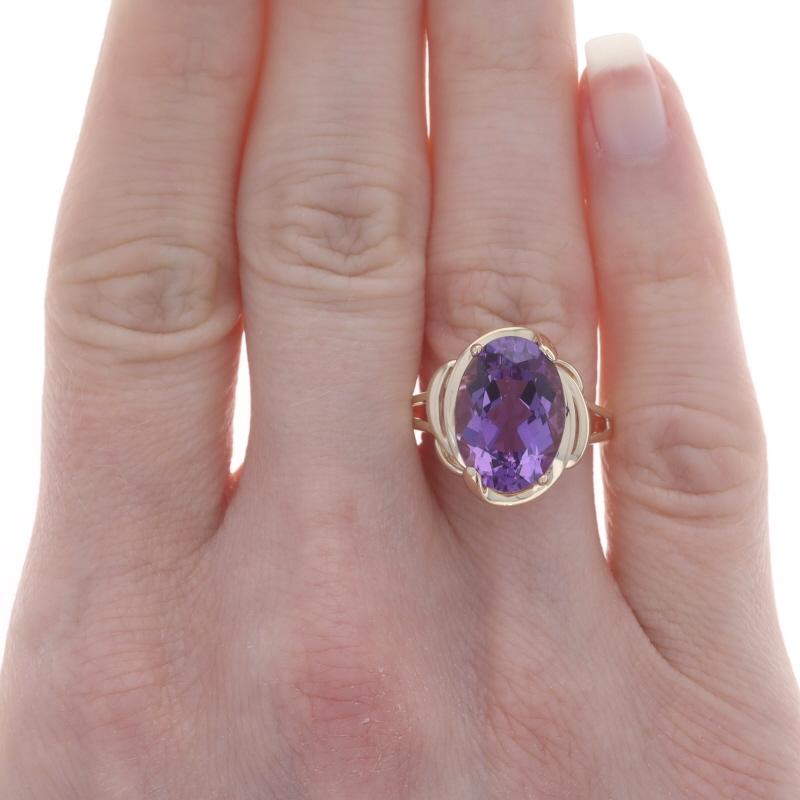 Size: 7
Sizing Fee: Up 2 sizes for $35 or Down 2 sizes for $30

Metal Content: 14k Yellow Gold

Stone Information
Natural Amethyst
Carat(s): 6.50ct
Cut: Oval
Color: Purple

Total Carats: 6.50ct

Style: Cocktail Solitaire
Features: Split