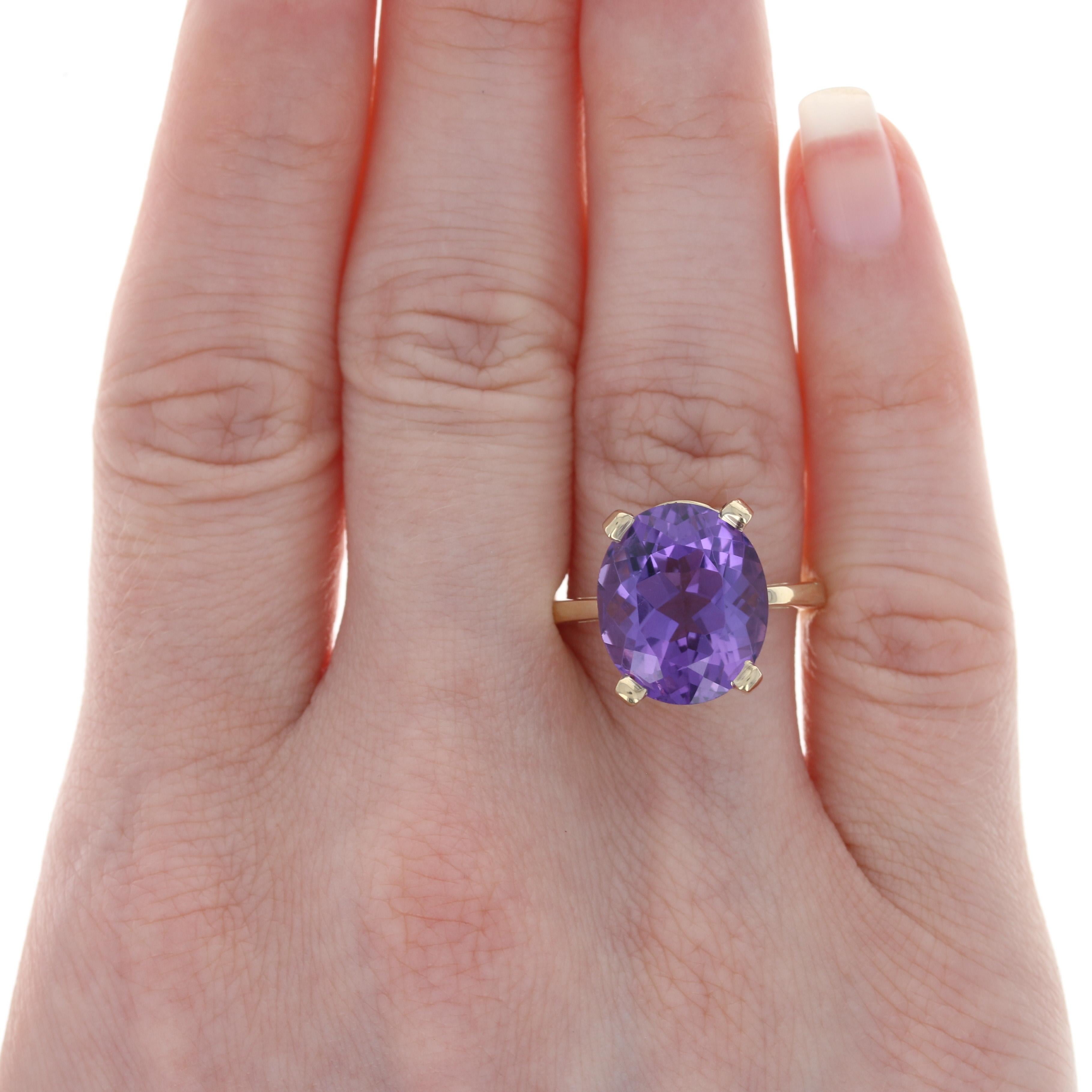 Size: 7 1/4
Sizing Fee: Down or up 2 sizes for a $25 fee

Metal Content: 14k Yellow Gold

Stone Information: 
Genuine Amethyst
Carat: 8.20ct
Cut: Oval
Color:  Purple
Size: 14.2mm x 12mm

Style: Cocktail Solitaire
Features: Cathedral Mount

Face