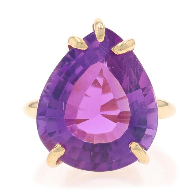 Size: 4 1/4
Sizing Fee: Up 3 sizes for $40 or Down 1/2 a size for $30

Metal Content: 14k Yellow Gold

Stone Information

Natural Amethyst
Carat(s): 12.75ct
Cut: Pear
Color: Purple

Total Carats: 12.75ct

Style: Cocktail