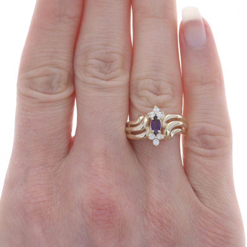 Size: 6
Sizing Fee: Up 2 sizes for $35 or Down 2 sizes for $30

Metal Content: 14k Yellow Gold

Stone Information

Natural Amethyst
Carat(s): .20ct
Cut: Marquise
Color: Purple

Natural Diamonds
Carat(s): .15ctw
Cut: Round Brilliant
Color: G -