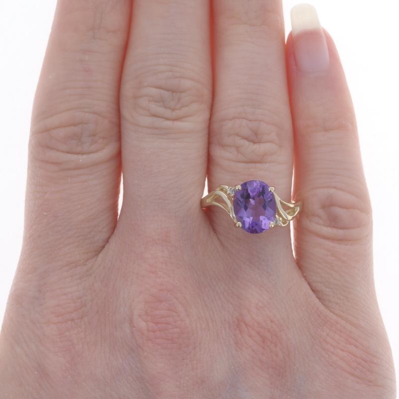 Size: 8
Sizing Fee: Up 2 sizes for $35 or Down 3 sizes for $30

Metal Content: 14k Yellow Gold

Stone Information

Natural Amethyst
Carat(s): 2.20ct
Cut: Oval
Color: Purple

Natural Diamonds
Cut: Round Brilliant
Stone Note: (two small