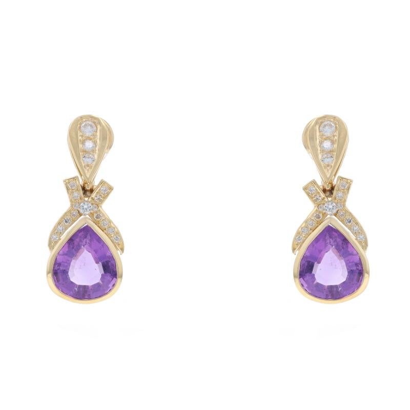 Metal Content: 14k Yellow Gold & 14k White Gold

Stone Information

Natural Amethysts
Carat(s): 9.95ctw
Cut: Pear
Color: Purple

Natural Diamonds
Carat(s): .70ctw
Cut: Round Brilliant
Color: G - H
Clarity: VS1 - VS2

Total Carats: 10.65ctw

Style: