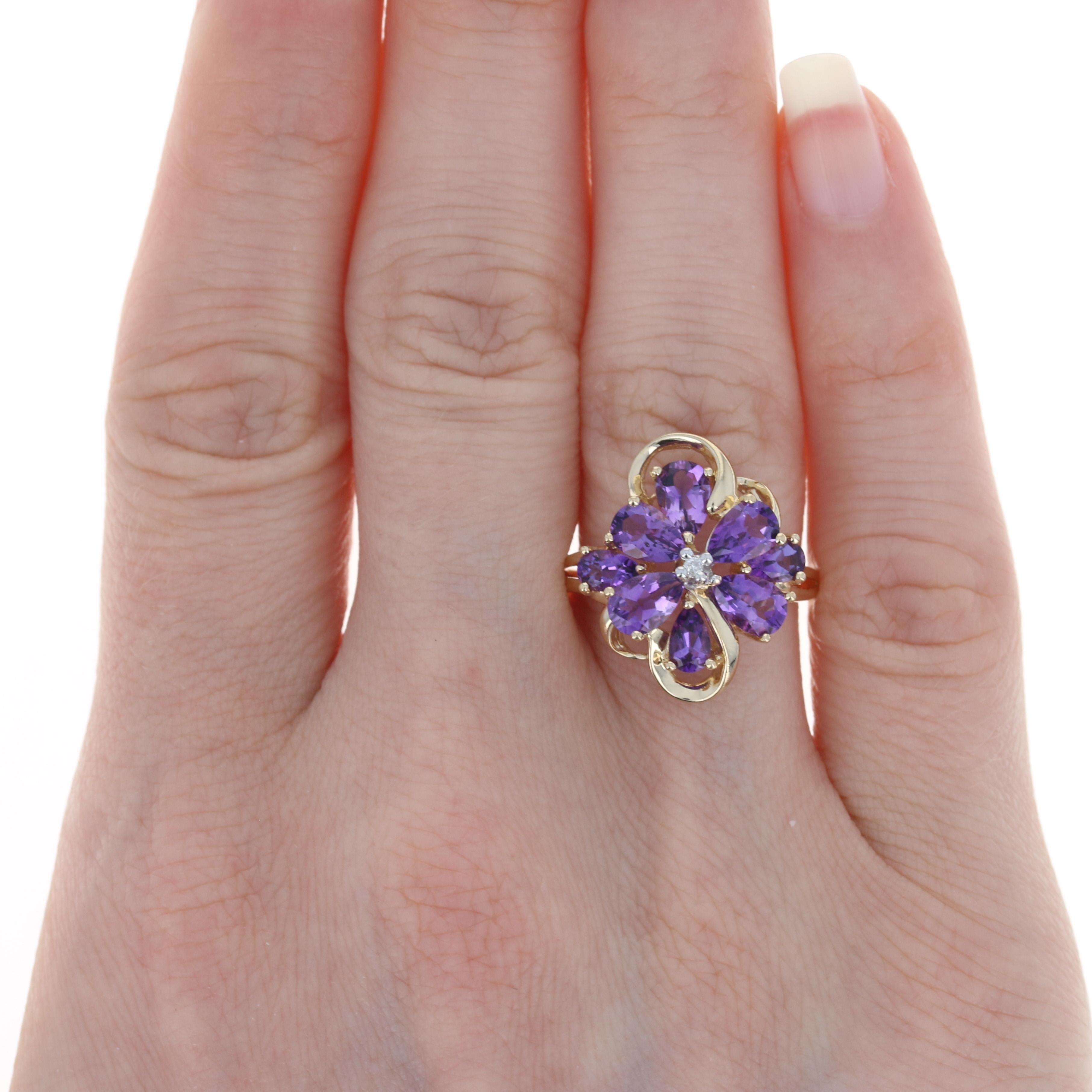 Size: 7 1/4
 Sizing Fee: Down 2 sizes for $20 or Up 2 sizes for $25
 
 Metal Content: 14k Yellow Gold & 14k White Gold 
 
 Stone Information: 
 Genuine Amethysts
 Carats: 2.35ctw
 Cut: Pear
 Color: Purple
 
 Natural Diamond 
 Carat: .01ct
 Cut: