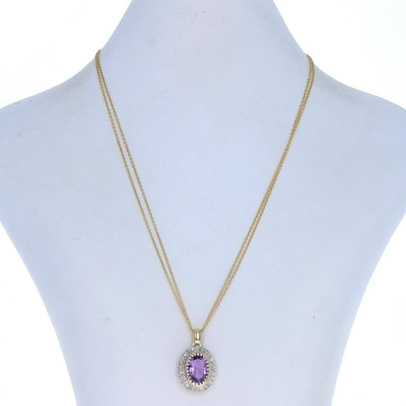 Metal Content: 14k Yellow Gold & 14k White Gold

Stone Information
Genuine Amethyst
Carat(s): 6.50ct
Cut: Oval
Color: Purple

Natural Diamonds
Carat(s): .25ctw
Cut: Single
Color: G - H
Clarity: SI2 - I1

Total Carats: 6.75ctw

Pendant Style: