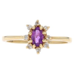 Bague en or jaune avec halo d
améthyste et de diamant - 10k Oval .31ctw Floral