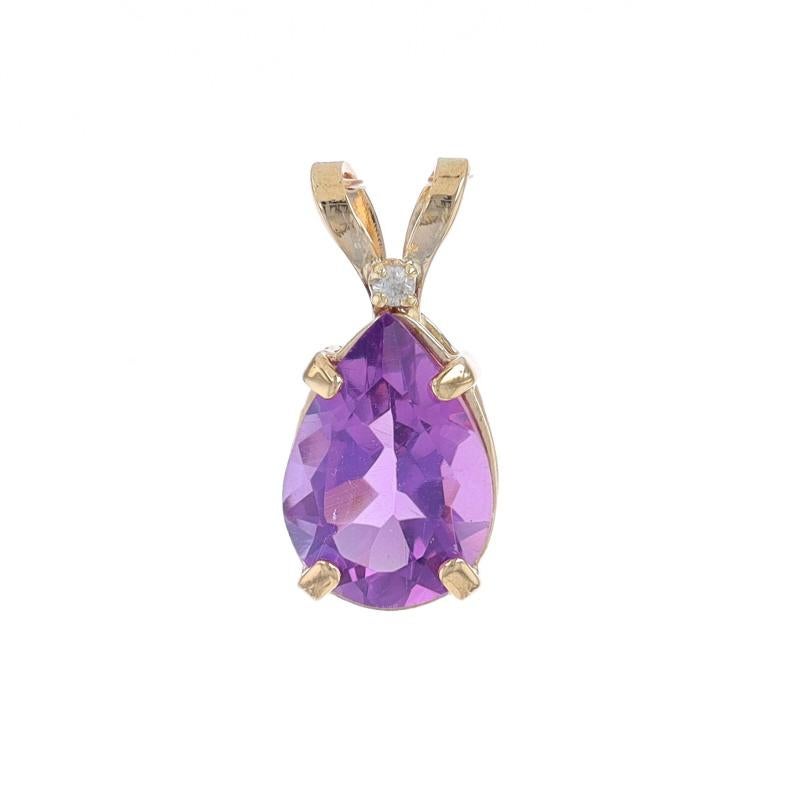 Metal Content: 14k Yellow Gold

Stone Information

Natural Amethyst
Carat(s): 1.70ct
Cut: Pear
Color: Purple

Natural Diamond
Cut: Round Brilliant
Stone Note: (one small accent)

Total Carats: 1.70ct

Measurements

Tall (from stationary bail):