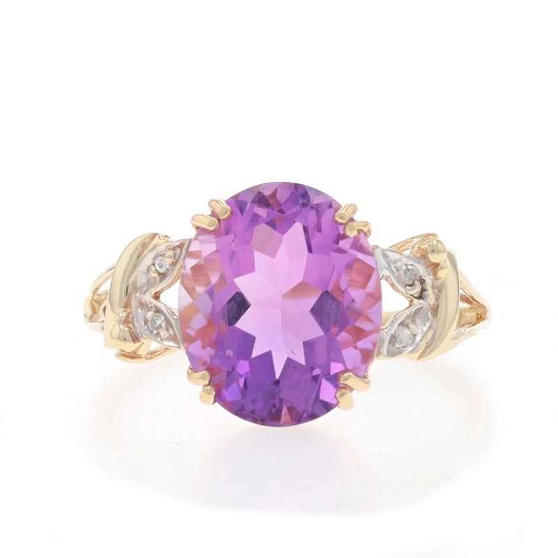 Size: 8 1/4
Sizing Fee: Up 2 sizes for $35 or Down 1 size for $30

Metal Content: 10k Yellow Gold & 10k White Gold

Stone Information

Natural Amethyst
Carat(s): 4.50ct
Cut: Oval
Color: Purple

Natural Diamonds
Cut: Single
Stone Note: (four small