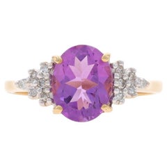 Bague en or jaune 14 carats, diamants et améthyste ovale 1,85 carat