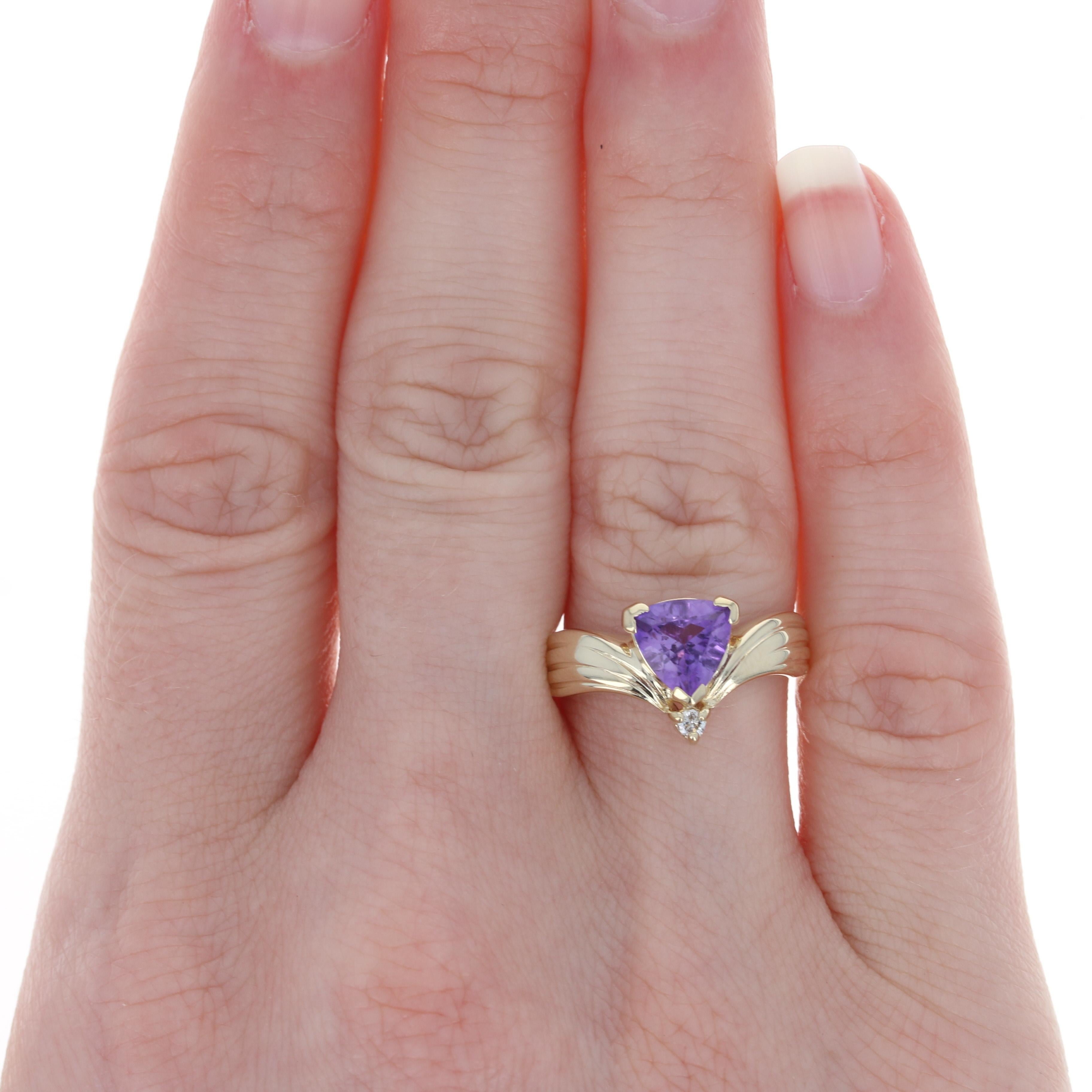 Size: 7 1/4
 Sizing Fee: Up 2 sizes for $25 or Down 2 sizes for $20
 
 Metal Content: 14k Yellow Gold
 
 Stone Information: 
 Genuine Amethyst
 Carat: 1.30ct
 Cut: Trillion
 Color: Purple 
 
 Natural Diamond
 Carat: .03ct
 Cut: Round Brilliant
