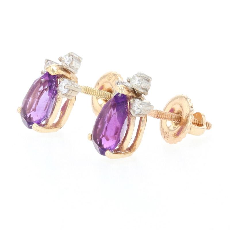 Metal Content: Guaranteed 14k Gold as stamped (yellow and white) 

Stone Information:
Genuine Amethysts
Color: Purple 
Cut: Pear-Shaped Brilliant
Carats: 1.45ctw

Natural Diamonds 
Clarity: SI1 - SI2
Color: F - G
Cut: Round Brilliant
Carats: