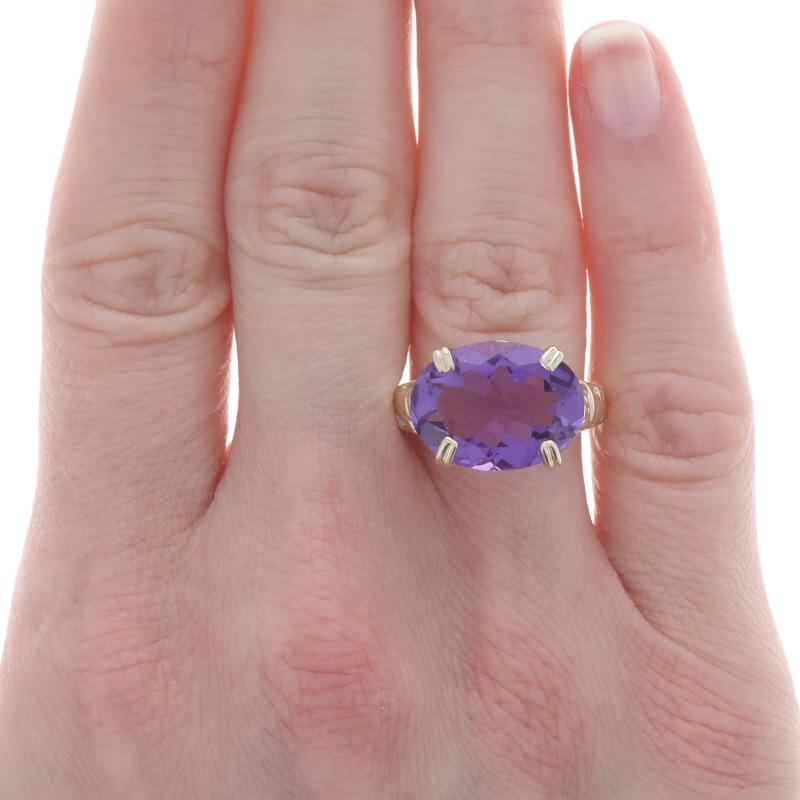 Size: 7 1/4
Sizing Fee: Up 2 sizes for $35 or Down 2 sizes for $30

Metal Content: 10k Yellow Gold

Stone Information

Natural Amethyst
Carat(s): 6.50ct
Cut: Oval
Color: Purple

Total Carats: 6.50ct

Style: Cocktail Solitaire
Theme: Elephant,