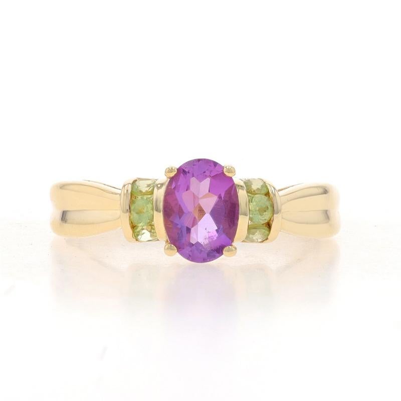 Size: 7
Sizing Fee: Up 1 size for $30 or Down 1 size for $30

Metal Content: 14k Yellow Gold

Stone Information

Natural Amethyst
Carat(s): .85ct
Cut: Oval
Color: Purple

Natural Peridot
Carat(s): .30ctw
Cut: Round
Color: Green

Total Carats: