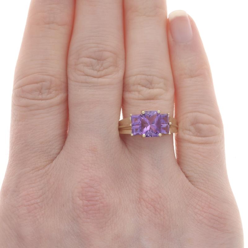 Size: 7 1/4
Sizing Fee: Up 1 size for $35 or Down 1 size for $30

Metal Content: 14k Yellow Gold

Stone Information

Natural Amethysts
Carat(s): 3.30ctw
Cut: Rectangle & Square
Color: Purple

Total Carats: 3.30ctw

Style: Solitaire with