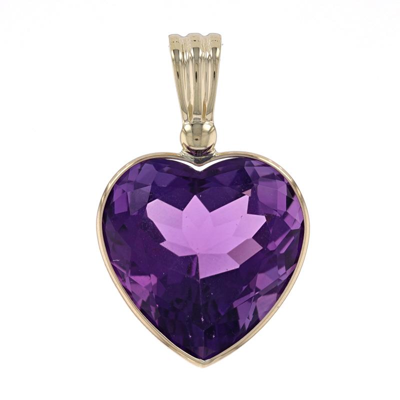 Metal Content: 14k Yellow Gold

Stone Information
Natural Amethyst
Carat(s): 4.80ct
Cut: Heart
Color: Purple

Total Carats: 4.80ct

Style: Solitaire
Theme: Love

Measurements
Tall (from stationary bail): 1 5/16