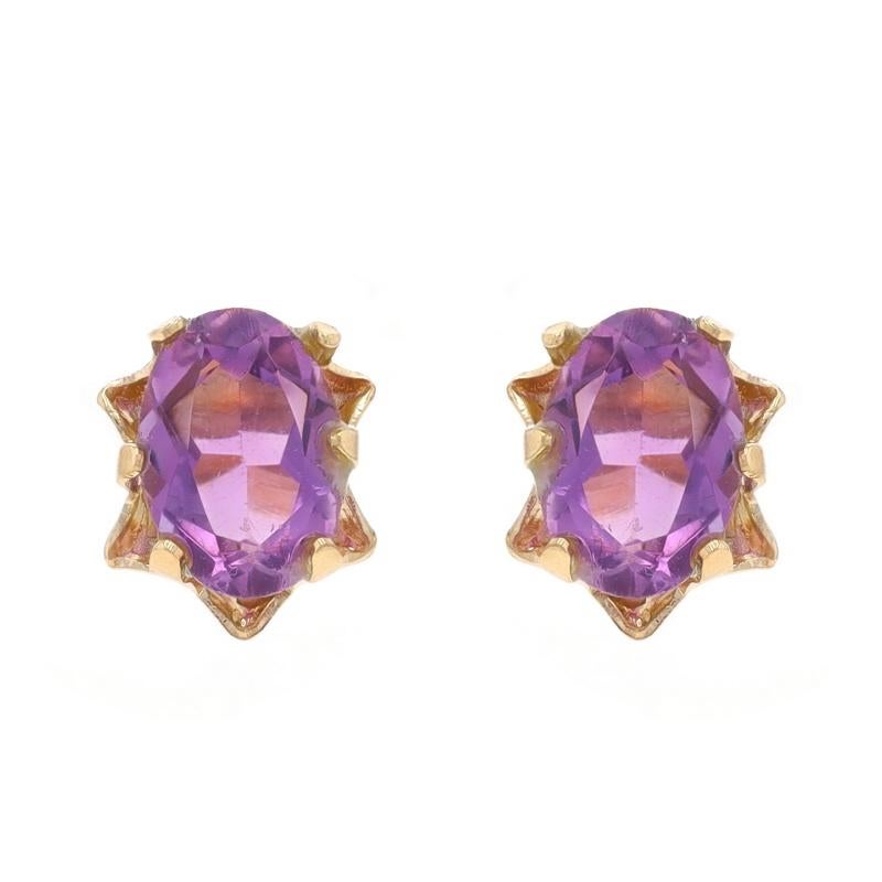 Metal Content: 14k Yellow Gold

Stone Information

Natural Amethysts
Carat(s): 1.70ctw
Cut: Oval
Color: Purple

Total Carats: 1.70ctw

Style: Stud
Fastening Type: Butterfly Closures

Measurements

Tall: 11/32