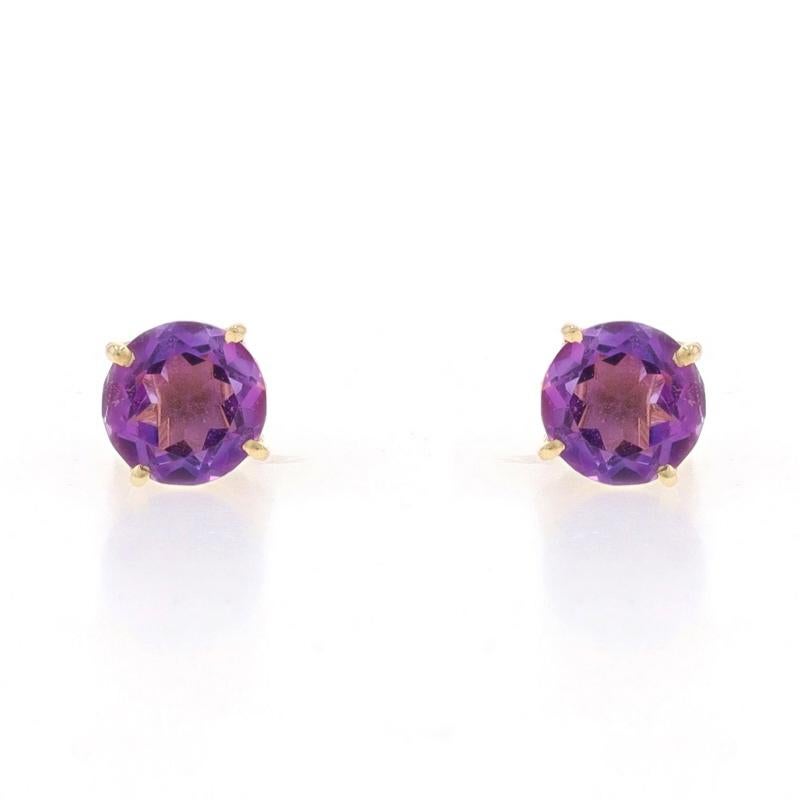 Metal Content: 14k Yellow Gold

Stone Information

Natural Amethysts
Carat(s): 1.40ctw
Cut: Round
Color: Purple

Total Carats: 1.40ctw

Style: Stud
Fastening Type: Butterfly Closures

Measurements

Diameter: 1/4