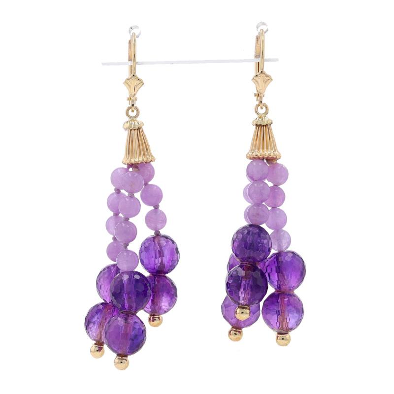 Metal Content: 14k Yellow Gold

Stone Information

Natural Amethysts
Cut: Bead
Color: Light Purple
Diameter: 4.3mm

Natural Amethysts
Cut: Faceted Bead
Color: Purple
Diameter: 8mm - 8.1mm

Style: Dangle
Fastening Type: Leverback Closures
Theme: