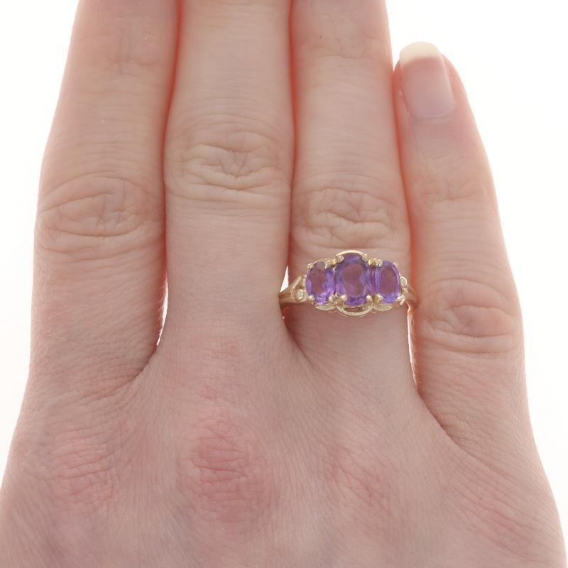 Oval Cut Yellow Gold Amethyst Three-Stone Ring - 14k Oval 1.75ctw For Sale