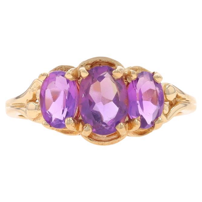 Yellow Gold Amethyst Three-Stone Ring - 14k Oval 1.75ctw For Sale