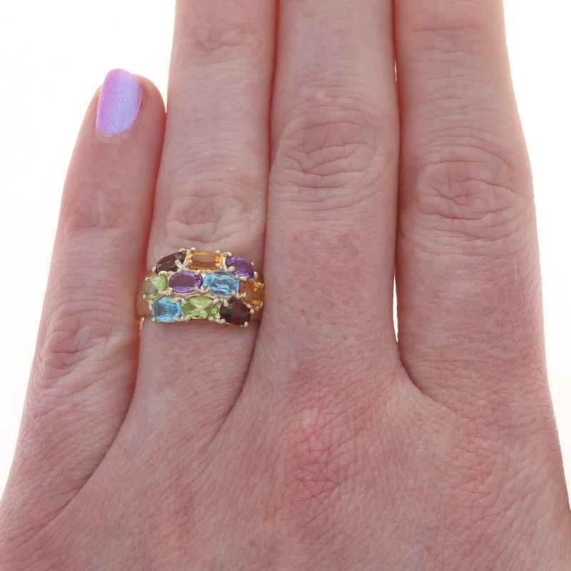 Size: 6 1/4
Sizing Fee: Up 1 size for $40 or Down 1/2 a size for $40

Metal Content: 14k Yellow Gold

Stone Information

Natural Amethyst
Carat(s): .46ctw
Cut: Oval

Natural Blue Topaz
Carat(s): .56ctw
Cut: Oval

Natural Citrine
Treatment: